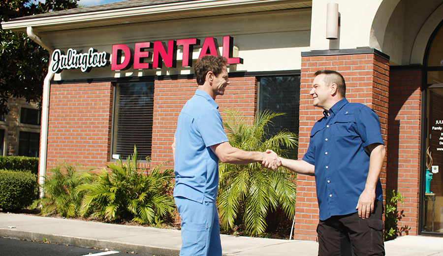 Julington Dental team members greeting outside the practice